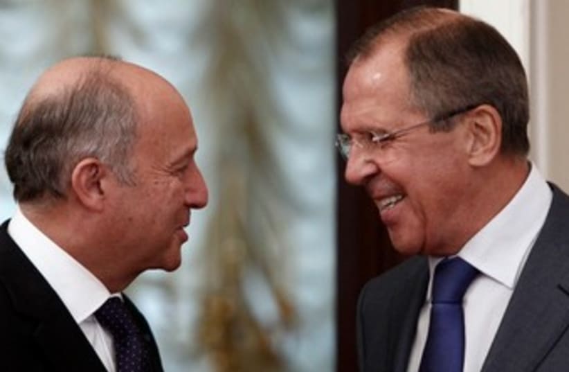 Russian French FMs Moscow 17.9.13 370 (photo credit: Reuters)