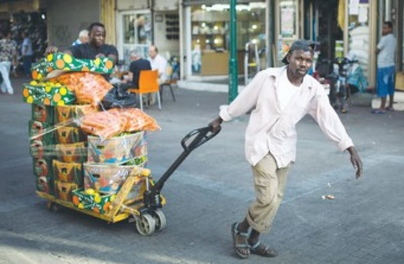 African migrants transport vegetables in south Tel Aviv 370 (photo credit: REUTERS)