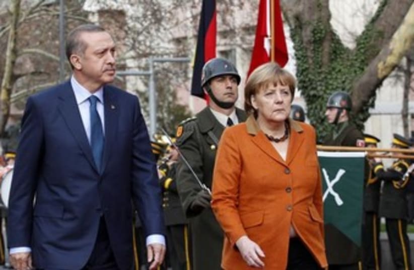 Erdogan and Merkel 370 (photo credit: REUTERS)