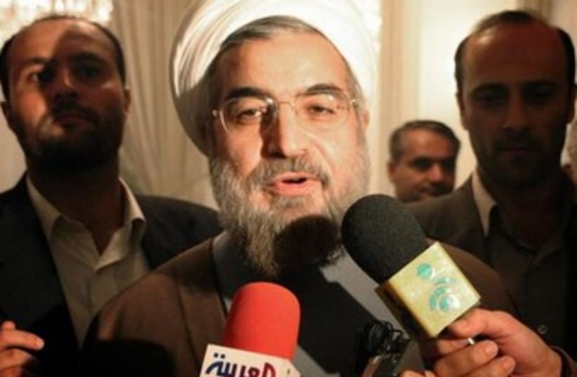 Rouhani talking to reporters 370 (photo credit: REUTERS)