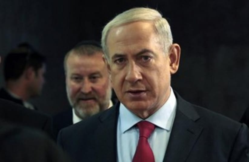 Netanyahu looking serious 370 (photo credit: REUTERS/Ammar Awad)