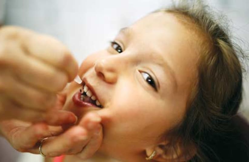 Vaccination against polio (photo credit: Reuters)