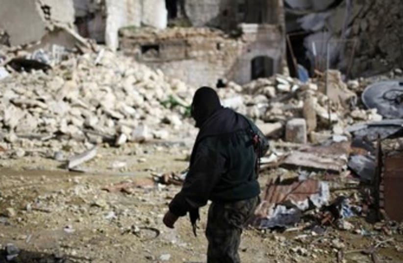 Al-Nusra fighter in Aleppo 370 (photo credit: REUTERS)