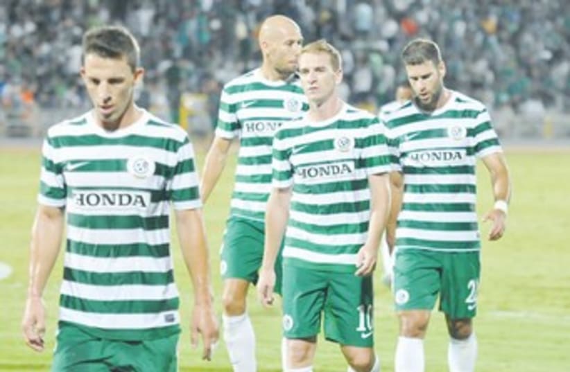 Maccabi Haifa players after loss to Mac TA 370 (photo credit: Uzi Gal)