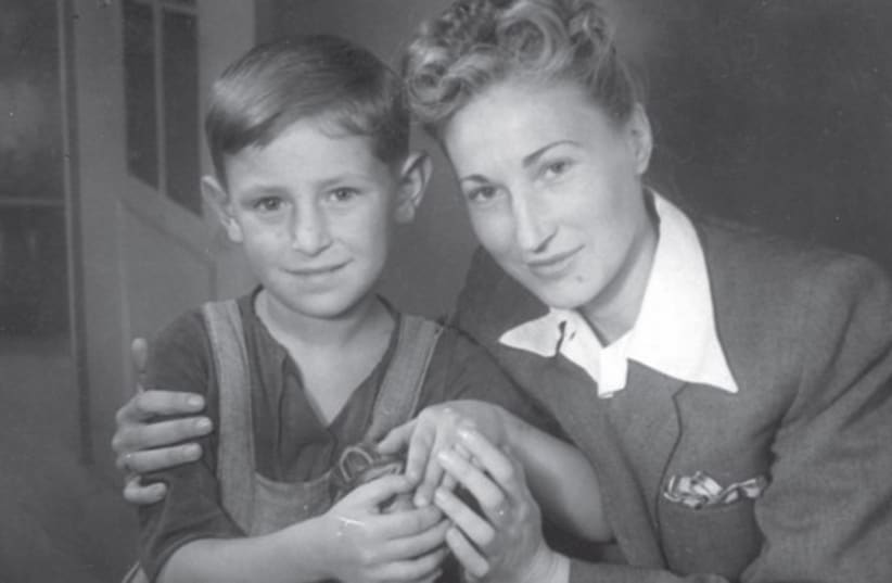 Genowefa Majcher with the boy she rescued Bialystock in 1947 (photo credit: Courtesy Ya d Vashem)