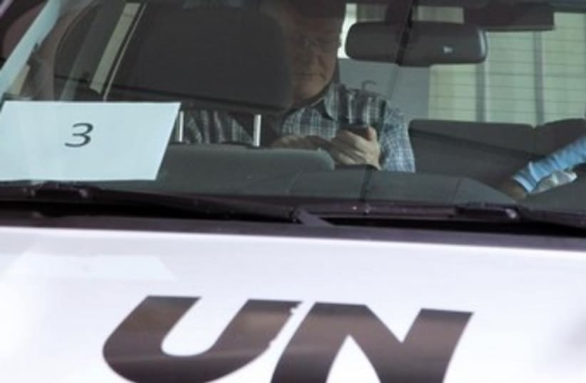 UN inspector in car 370 (photo credit: REUTERS)