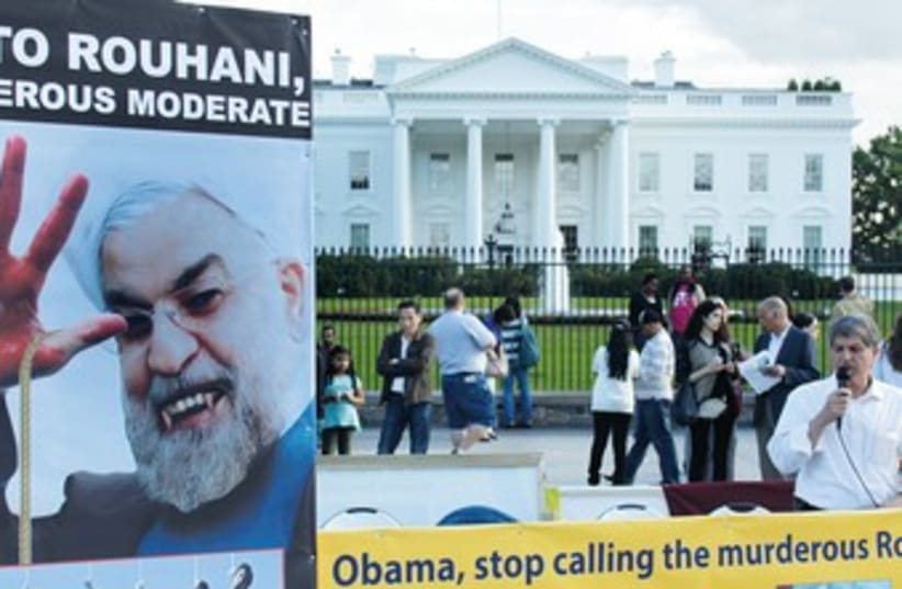 Vampire Rouhani protest sign 370 (photo credit: REUTERS)