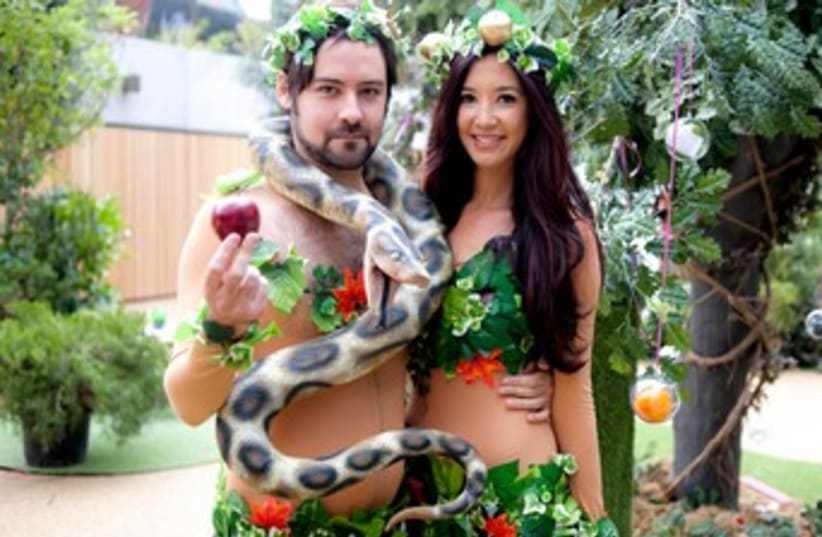 Models portraying Adam and Eve at the Genesis-themed opening (photo credit: Blake Ezra Photography)