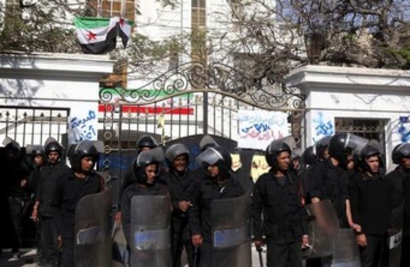 Police stand guard outside the Iranian ambassador's house 37 (photo credit: REUTERS)