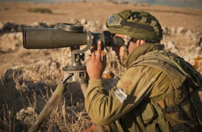An IDF soldier on the Golan Heights 370 (photo credit: Courtesy IDF)