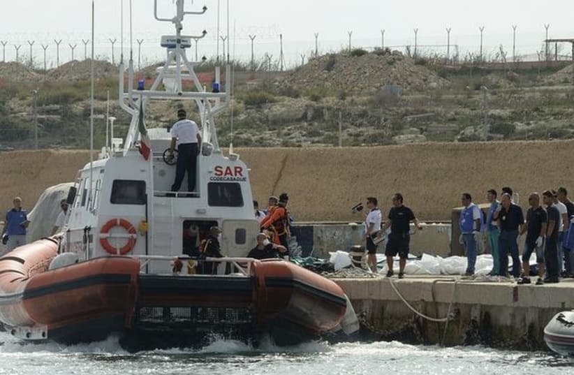 vessel boat migrants dead 370 (photo credit: REUTERS)