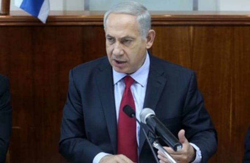 netanyahu at cabinet meeting gestures 150 (photo credit: Marc Israel Sellem/The Jerusalem Post)