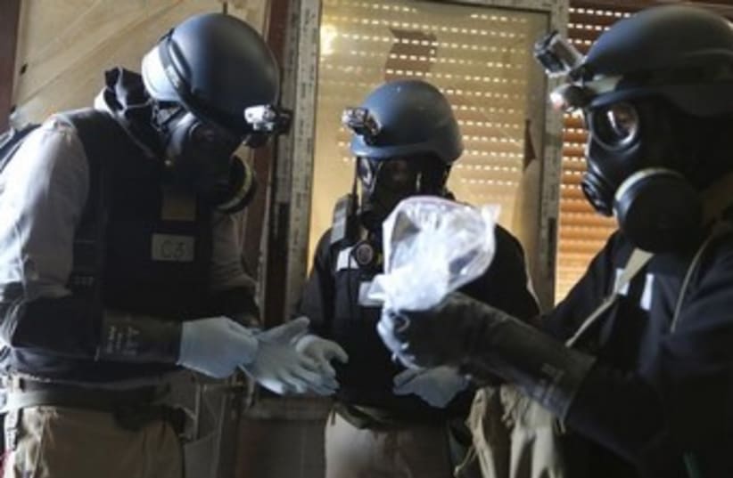 UN chemical inspectors in Syria 370 (photo credit: REUTERS/Mohamed Abdullah)