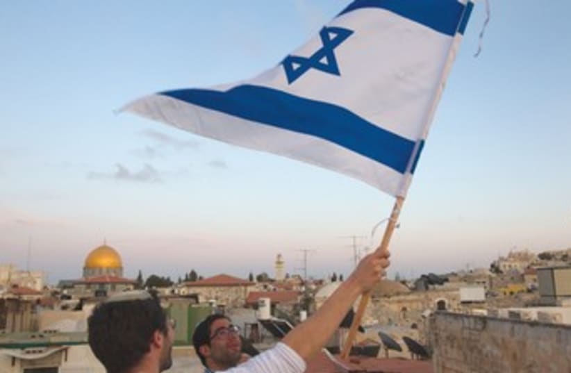 Israeli flag with Temple Mount background 370 (photo credit: REUTERS)