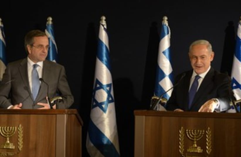 Netanyahu with Greek PM Antonis Samaras 370 (photo credit: Amos Ben-Gershom/GPO)