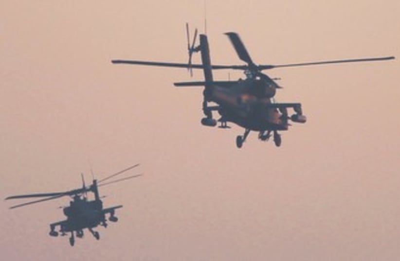 Egyptian Apache helicopters fly over Tahrir Square 370 (photo credit: REUTERS)