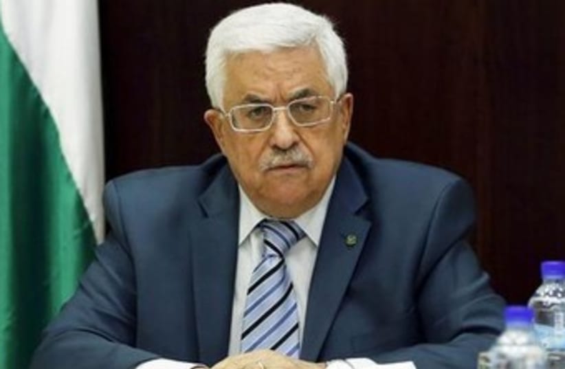 Abbas looking unhappy 370 (photo credit: REUTERS/Mohamad Torokman)