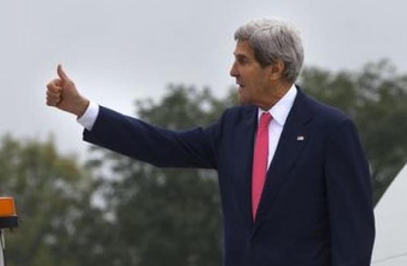 Kerry thumbs up (photo credit: Reuters)