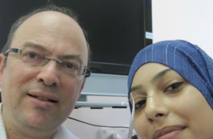 Prof. Braverman with hat pin and patient 370 (photo credit: Courtesy Hillel Jaffe Medical Center)