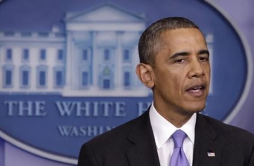 Obama talking about gov't shutdown 370 (photo credit: REUTERS/Yuri Gripas)