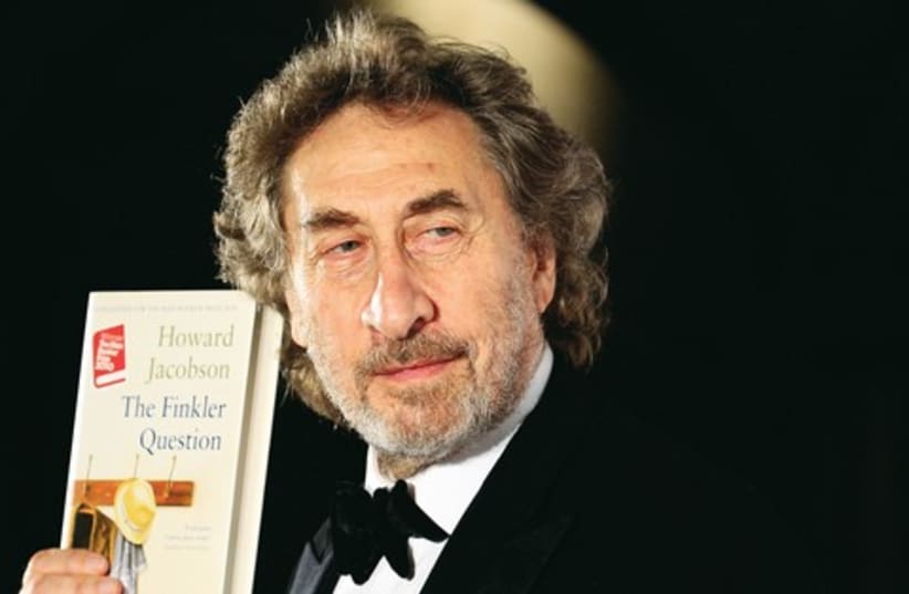 Howard Jacobson with book 521 (photo credit: REUTERS)
