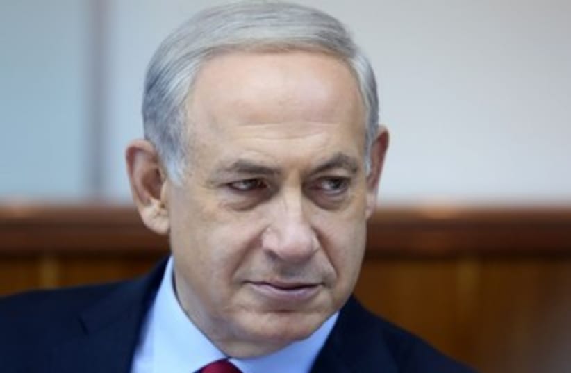Netanyahu serious at cabinet meeting 370 (photo credit: Marc Israel Sellem/The Jerusalem Post)