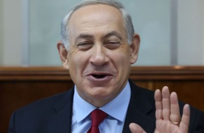 Netanyahu laughing 370 (photo credit: Marc Israel Sellem/The Jerusalem Post)