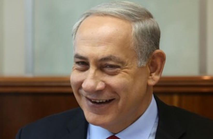 Netanyahu laughing 370 (photo credit: Marc Israel Sellem/The Jerusalem Post)