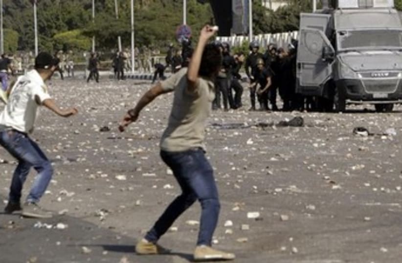 protesters clash with police in egypt 370 (photo credit: REUTERS)