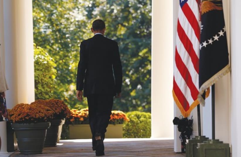 Obama walking away 521 (photo credit: Reuters)