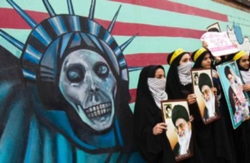 Anti-US poster on American embassy in Tehran 370 (photo credit: REUTERS)