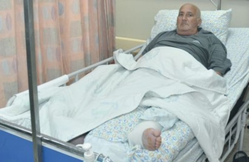 Shlomo Lankri in his bed at Emek Medical Center 370 (photo credit: Courtesy Emek Medical Center)