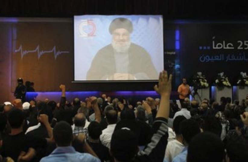 nasrallah speech on tv 370 (photo credit: REUTERS)