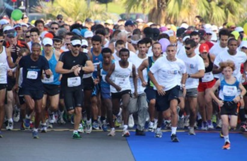 many runners, running 370  (photo credit: Courtesy, ELEM)
