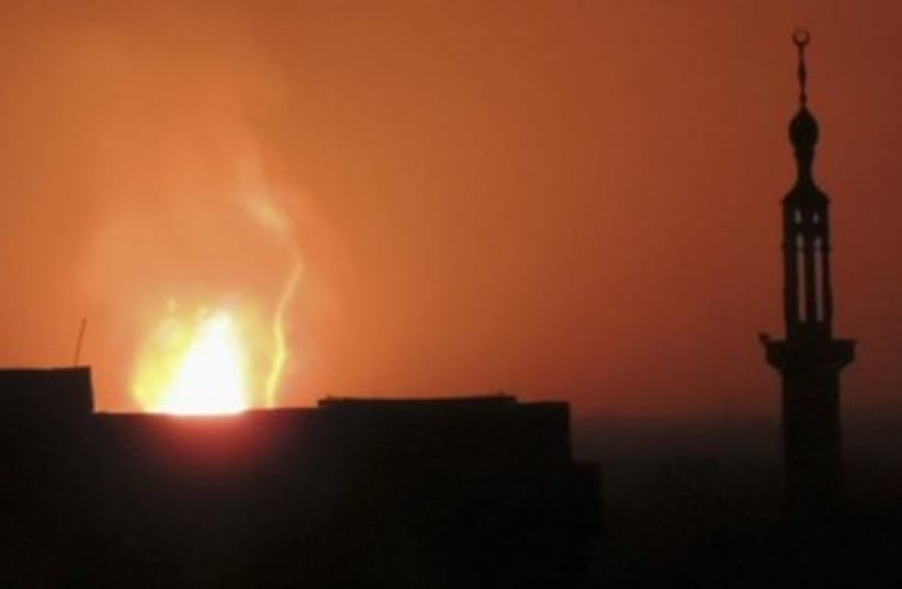 Fire seen rising above Damascus 370 (photo credit: REUTERS)