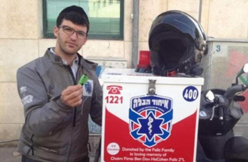 volunteer hillel with device 370 (photo credit: United Hatzalah courtesy)