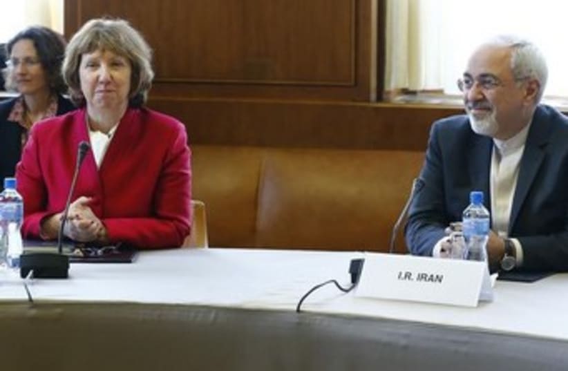 Catherine Ashton and Mohammad Zarif at nuclear talks 370 (photo credit: REUTERS/Denis Balibouse)