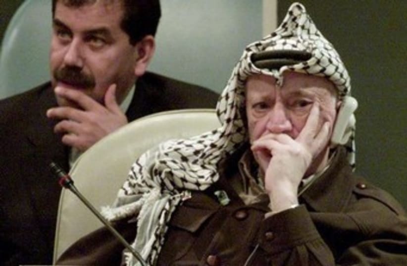 Yasser Arafat looking unhappy 370 (photo credit: REUTERS/Mike Segar)