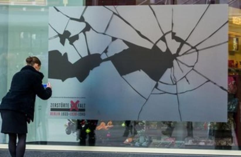 Kristallnacht stickers in Germany 370 (photo credit: REUTERS)