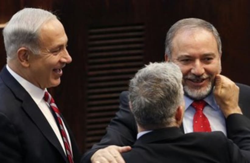 FM Liberman, PM Netanyahu, and Finance Min. Lapid 370 150 (photo credit: REUTERS)