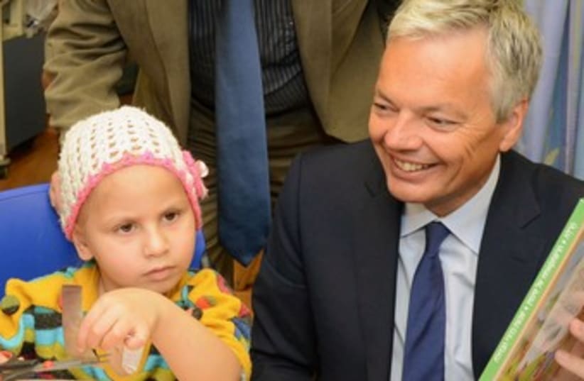 Belgium's foreign minister Didier Reynders with patient 370 (photo credit: Courtesy, Hadassah)