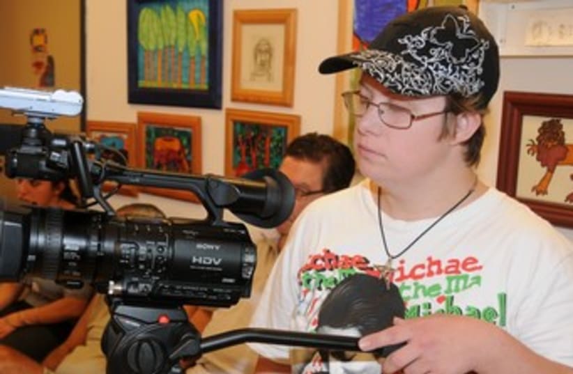 A young filmmaker at work 370 (photo credit: Courtesy Chimes )