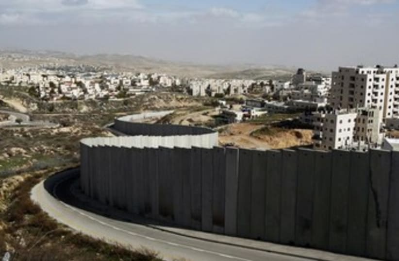 West Bank security barrier wall 370 (photo credit: REUTERS/Baz Ratner)