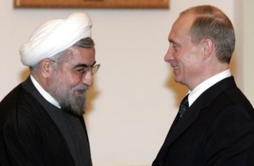 Rouhani and Puting 370 (photo credit: REUTERS/Viktor Korotayev CVI/MA)
