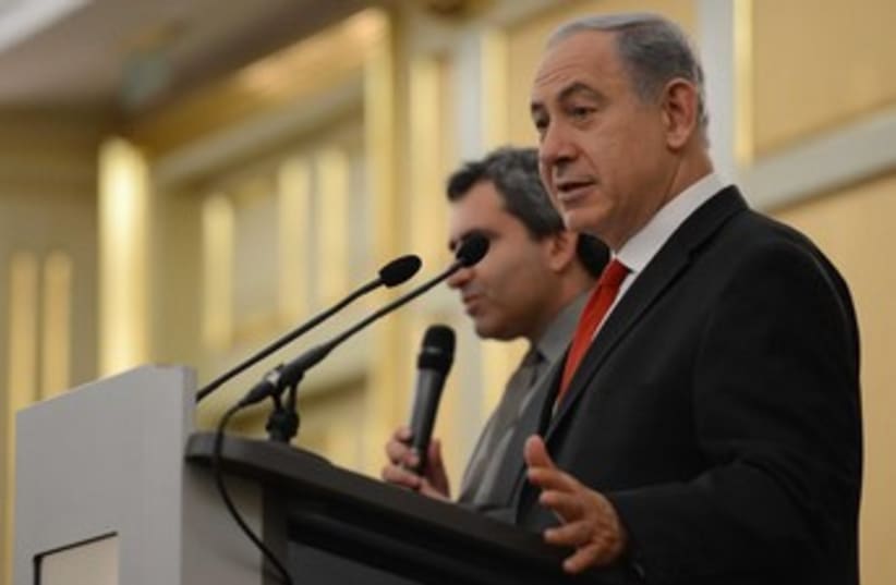Netanyahu in Russia speaking 370 (photo credit: Koby Gideon/GPO)