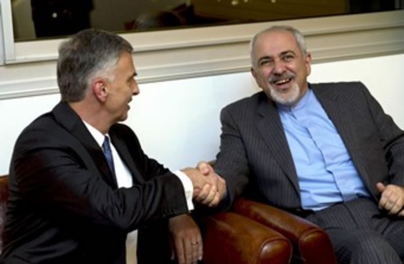 Iranian FM Zarif with Swiss FM in Geneva 370 (photo credit: REUTERS)