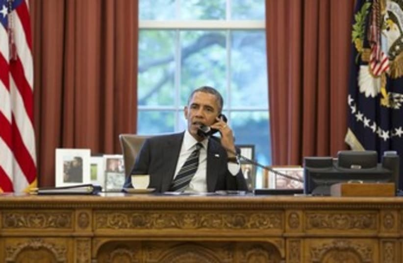 Obama in Oval Office on the phone 370 (photo credit: REUTERS/Pete Souza/The White House/Handout via Reu)