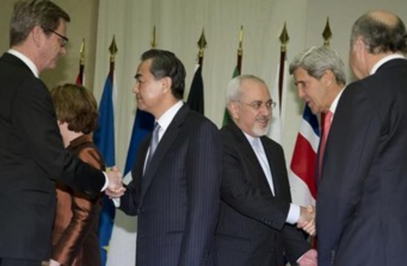 Zarif and Kerry at Iran nuclear talks in Geneva 370 (photo credit: REUTERS/Carolyn Kaster/Pool)