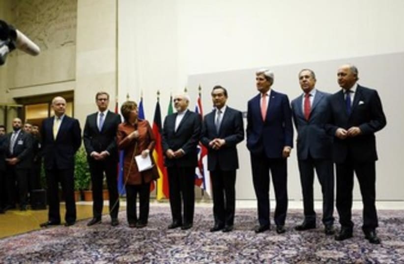 Geneva nuclear talks diplomats in line 370 (photo credit: REUTERS/Denis Balibouse)