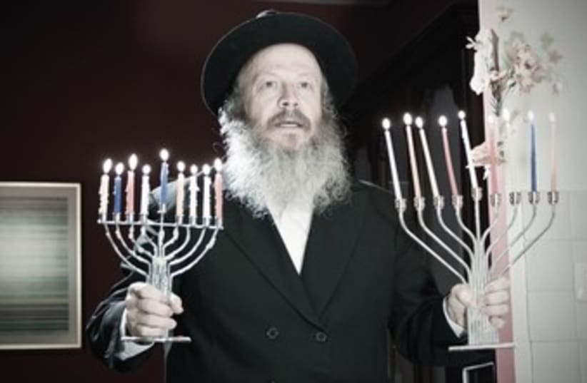 Hassid with menorah 370 (photo credit: Courtesy)